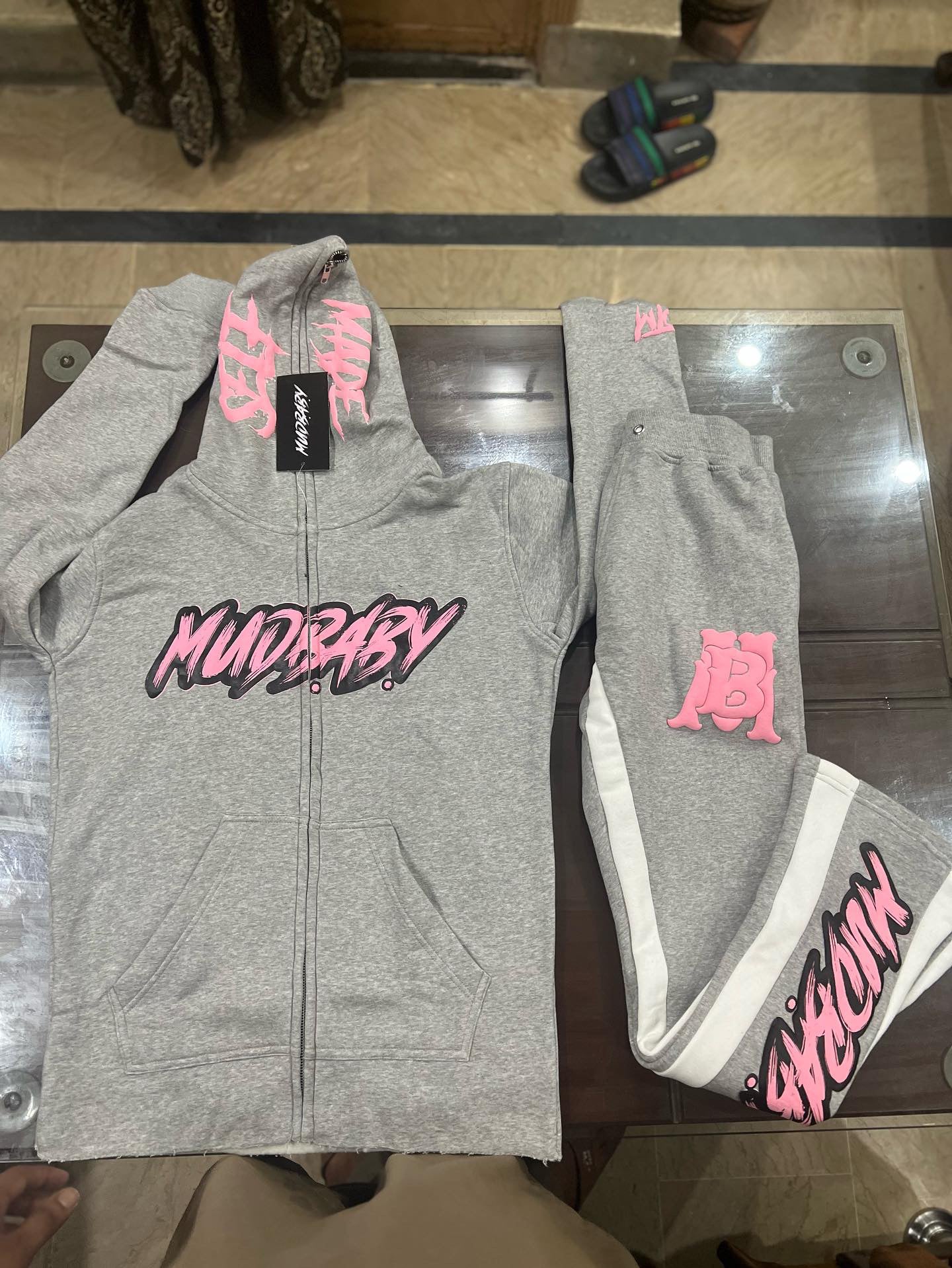 Grey and pink Out the mud flare suit