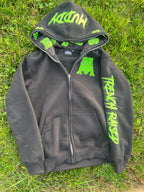 black and neon green zip up