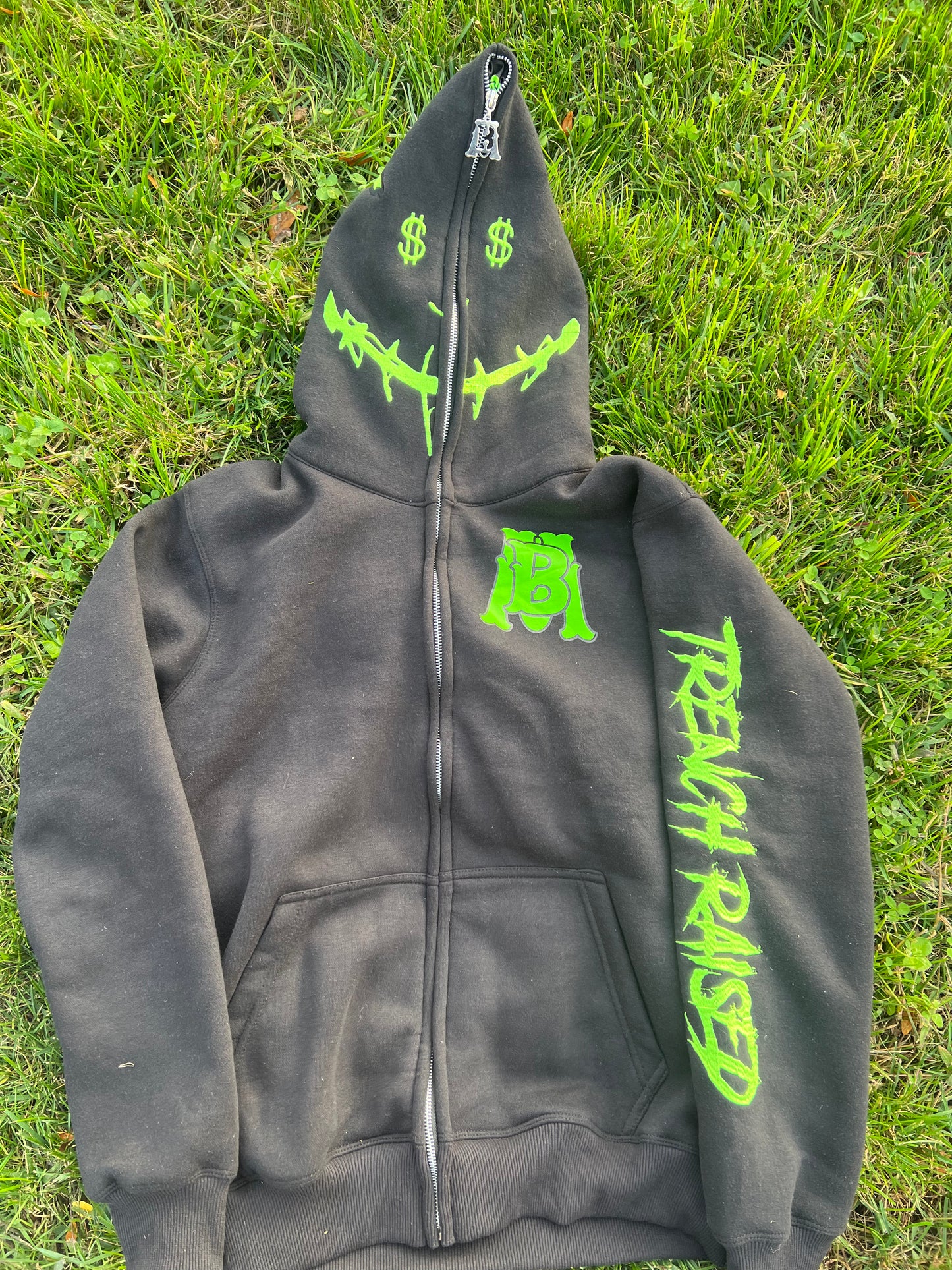 black and neon green zip up