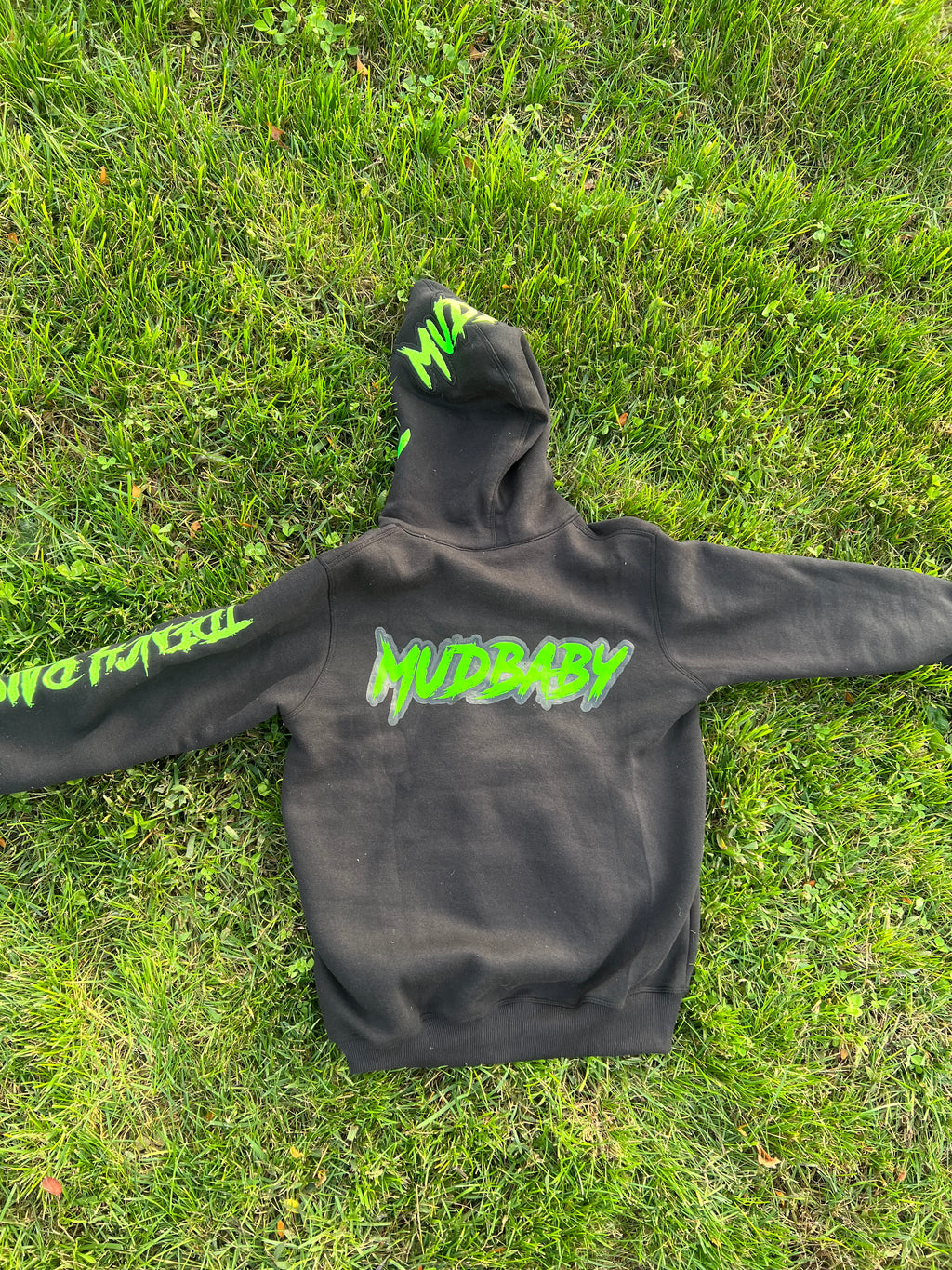 black and neon green zip up