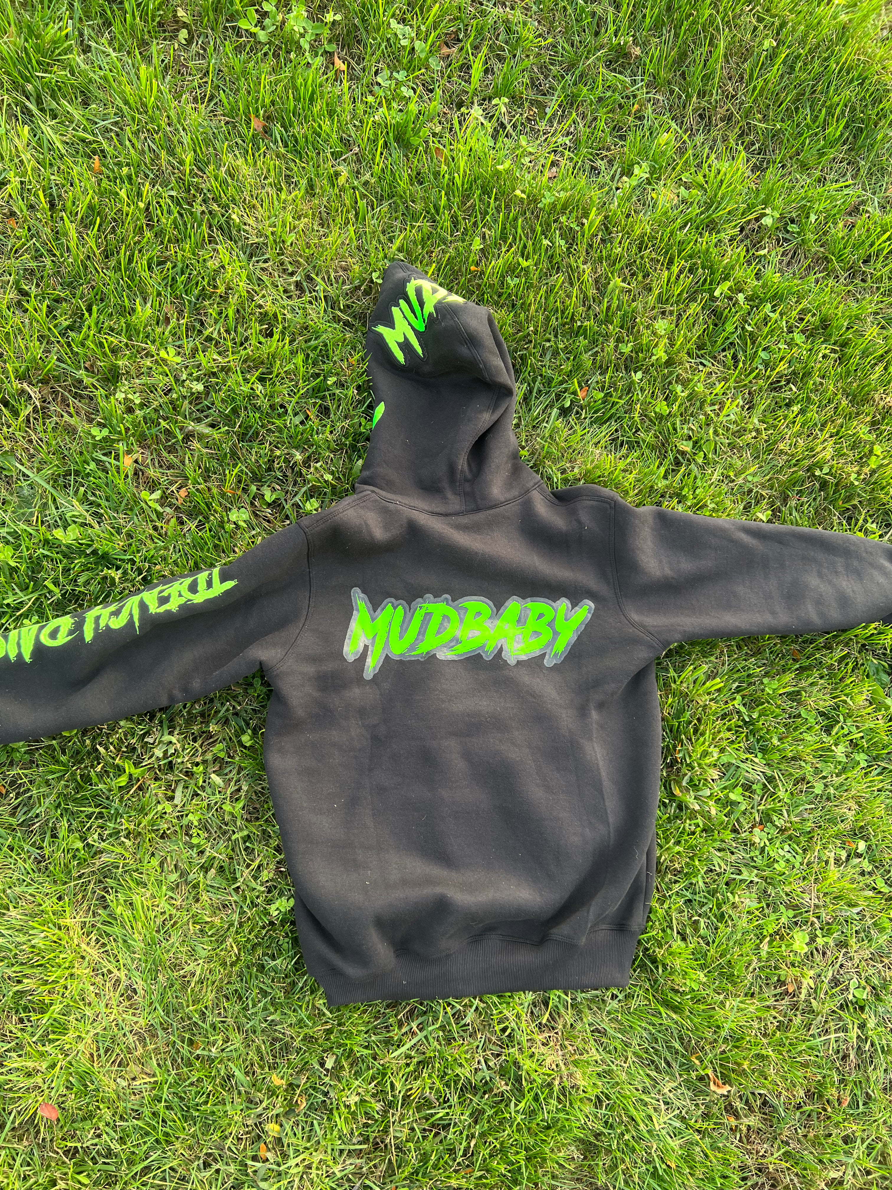 black and neon green zip up